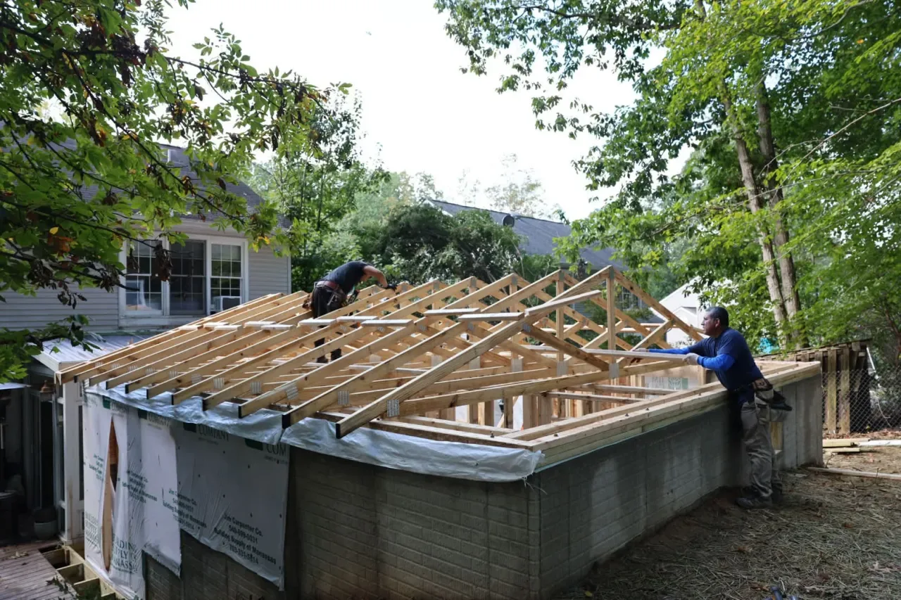Framing the roof, truss by truss