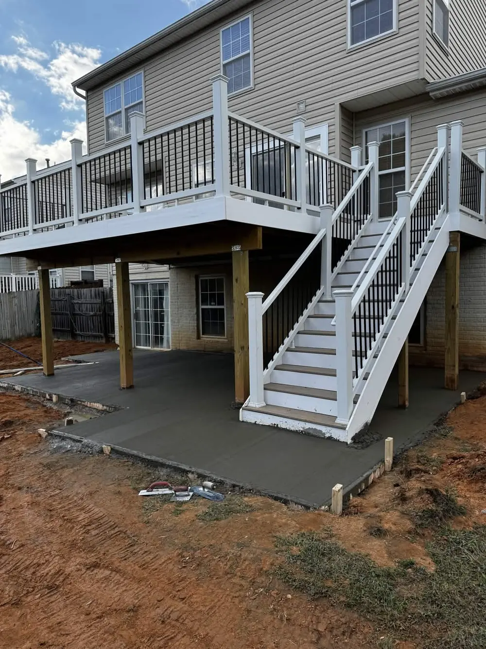 Elevated composite deck over a concrete patio