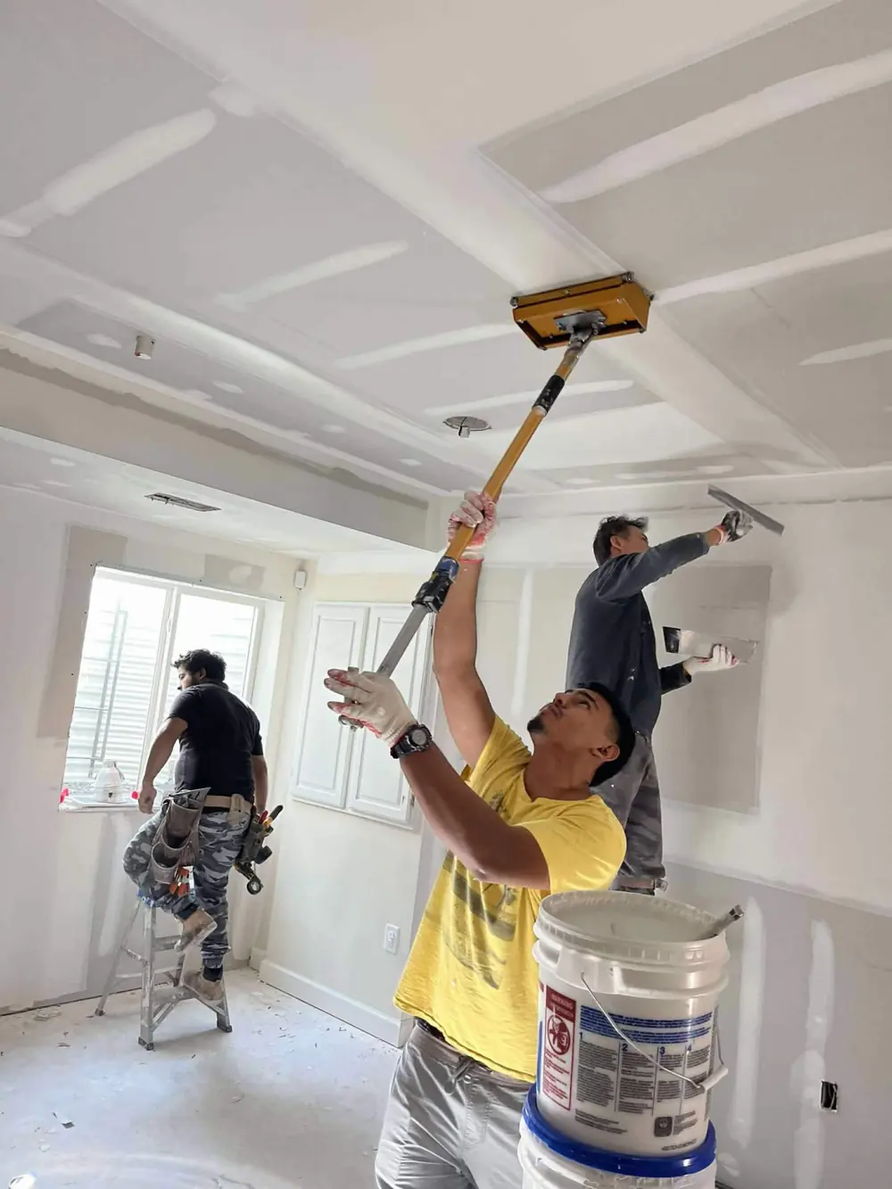 Skim-coating a ceiling